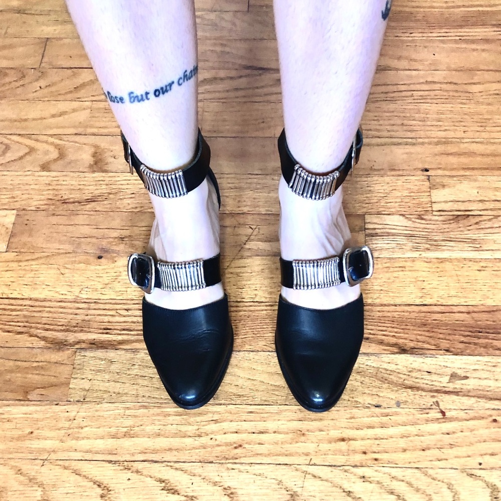 Black buckle low heels